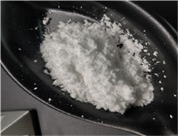 2-Benzyl-2-thiopseudourea hydrochloride