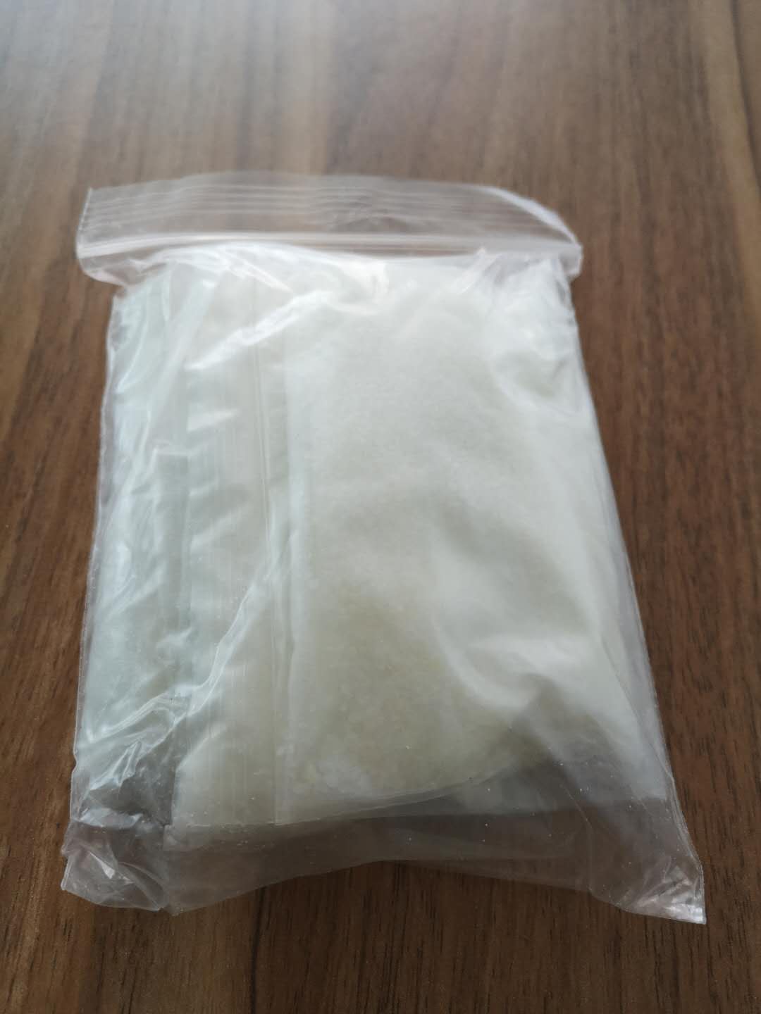 Methanol, 1-[[4-[bis(methoxymethyl)amino]-6-[(methoxymethyl)amino]-1,3,5-triazin-2-yl](methoxymethyl)amino]-